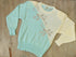 blue, silver and white 1980's sweater